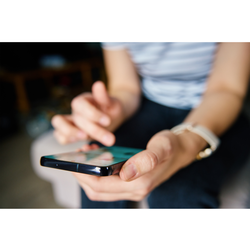 a person scrolls their phone