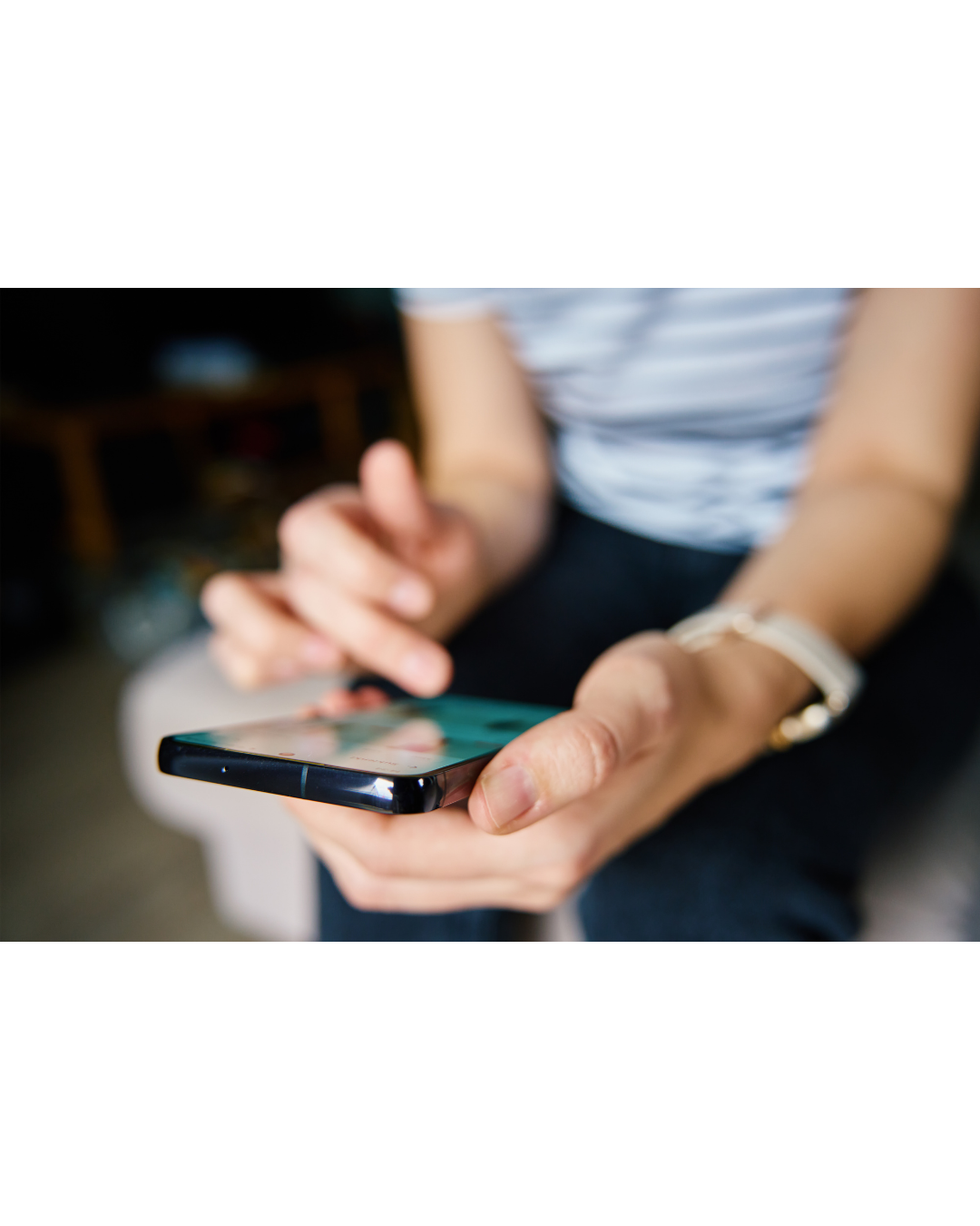 a person scrolls their phone