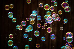 bubbles rise up in a black background