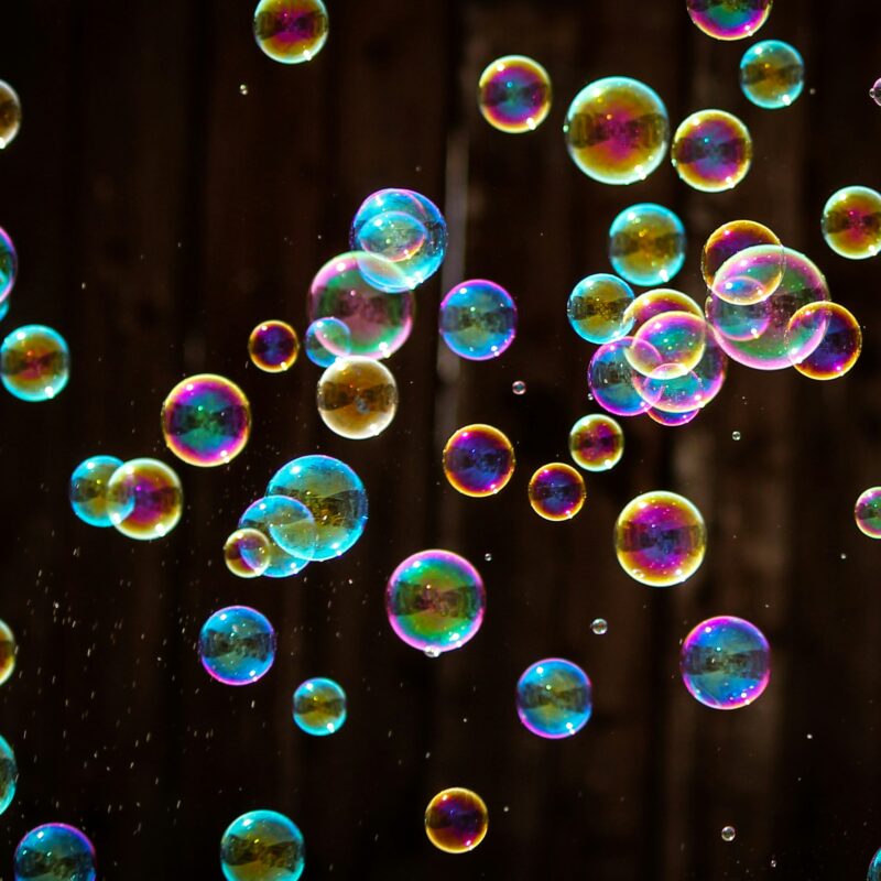 bubbles rise up in a black background