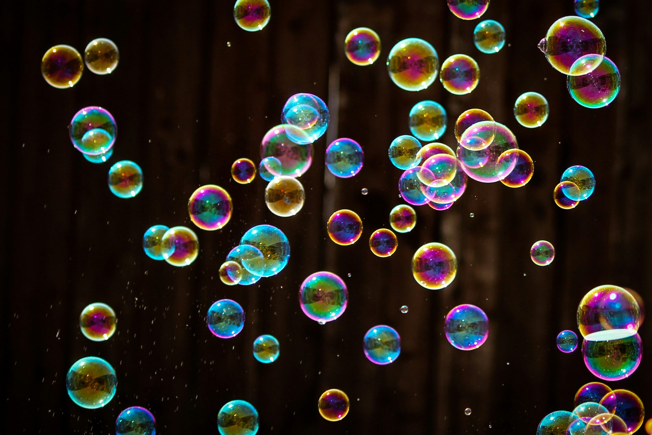 bubbles rise up in a black background